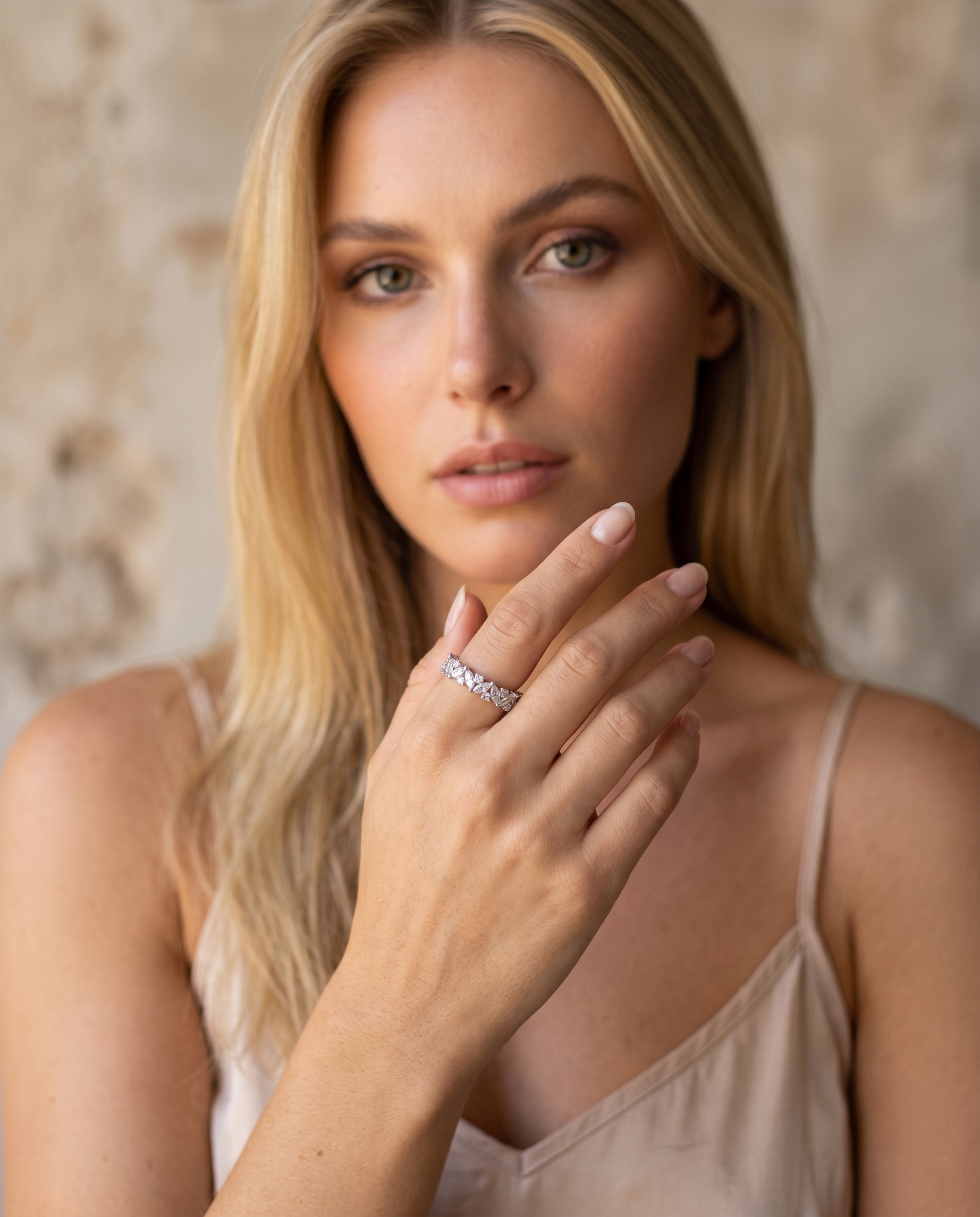 model-wearing-silver-castel-marquise-ring-lifestyle, elegant-modern-feminine-jewelry-on-hand, professional-women-luxury-accessories, chic-pavé-silver-styling, luxury-lifestyle-brand-model