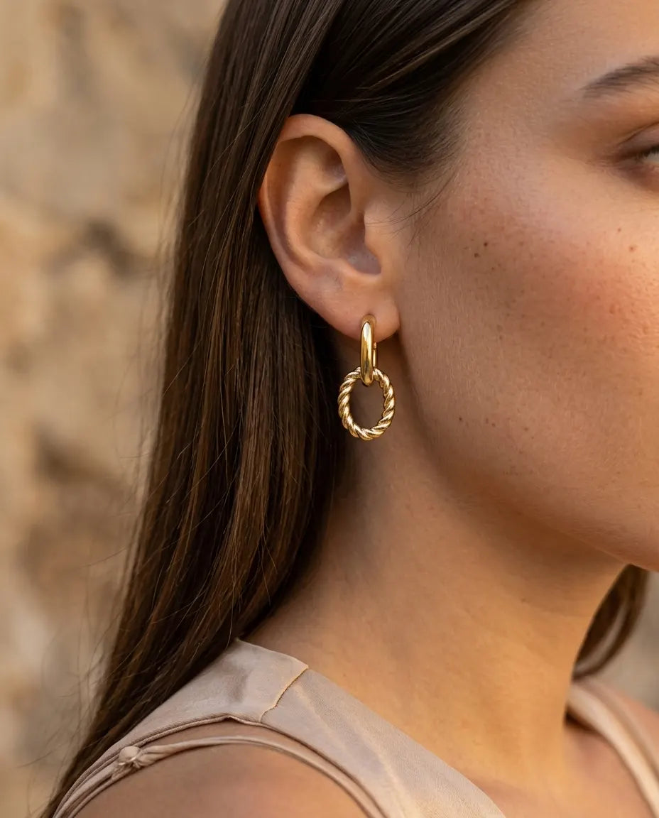 model-wearing-silver-ferrach-twisted-hoops, elegant-understated-cool-girl-jewelry-lifestyle, professional-women-minimalist-accessories, chic-twisted-link-earring-photography, luxury-lifestyle-brand-model