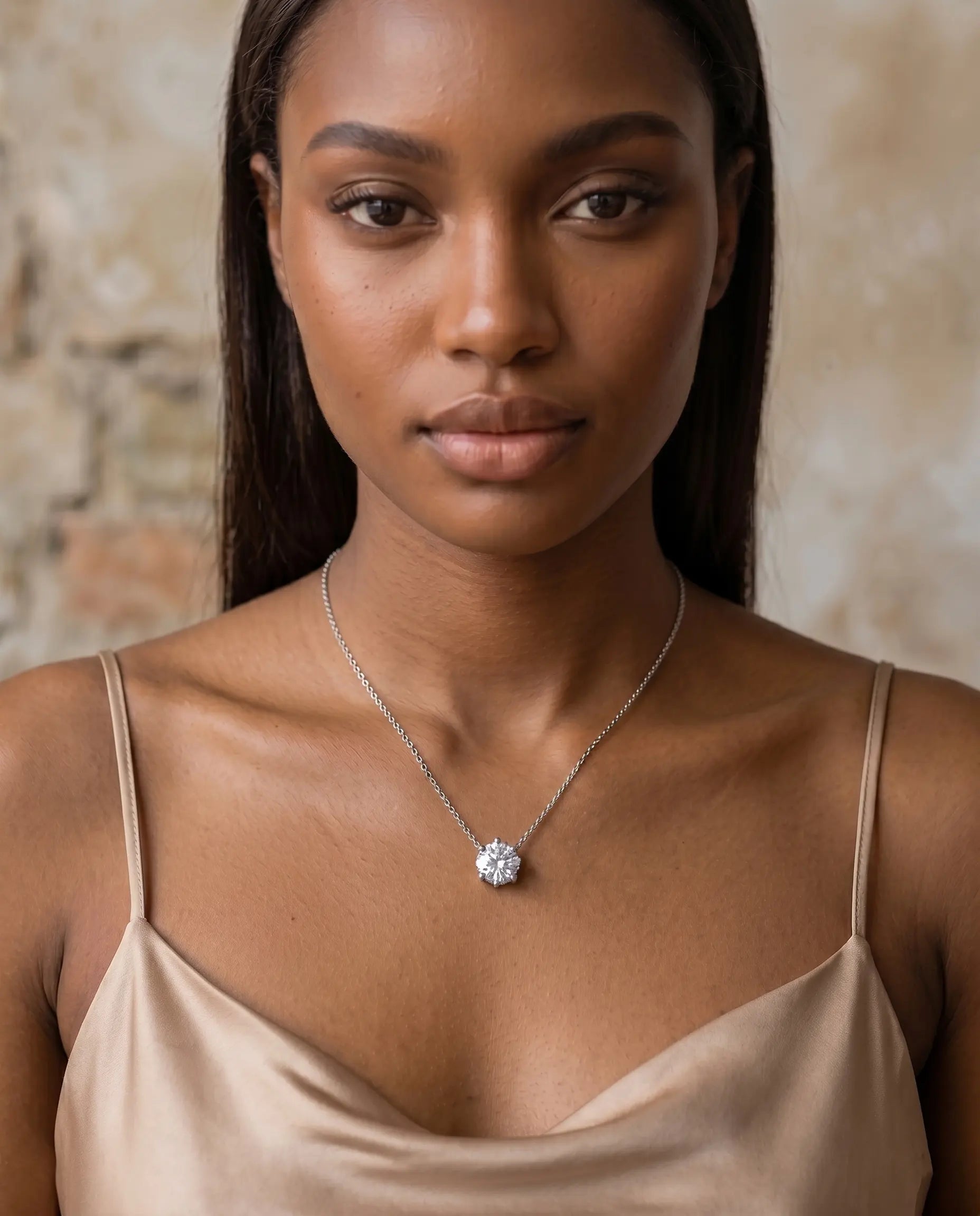 model-wearing-silver-orleans-solitaire-necklace-lifestyle, elegant-modern-feminine-jewelry-on-neck, professional-women-luxury-accessories, chic-sparkling-classic-necklace-styling, luxury-lifestyle-brand-model