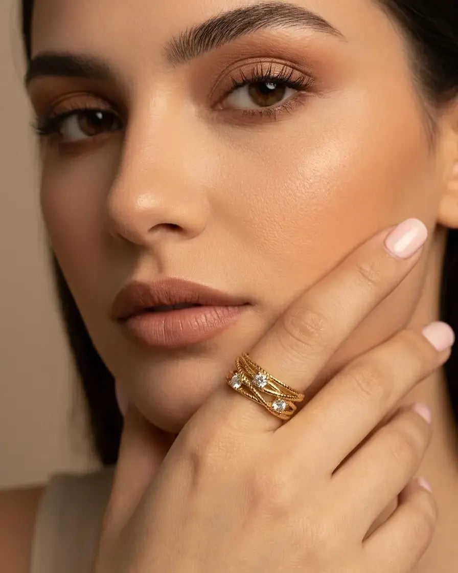 model-wearing-silver-titania-knot-ring-lifestyle, elegant-modern-feminine-jewelry-on-hand, professional-women-luxury-accessories, chic-pave-silver-styling, luxury-lifestyle-brand-model