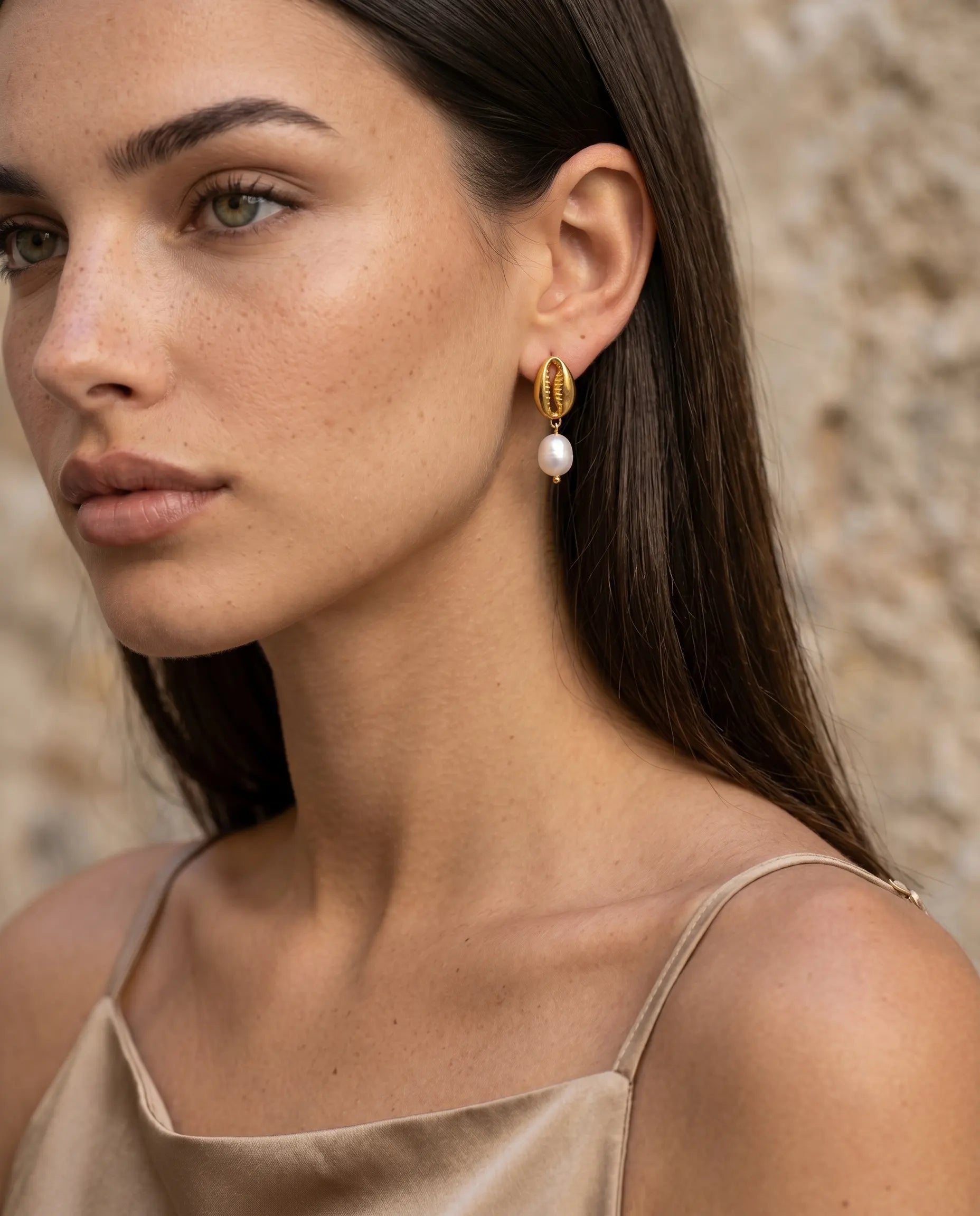 model-wearing-the-ava-linear-drop-studs-showcasing-sophisticated-vertical-design-and-minimalist-styling