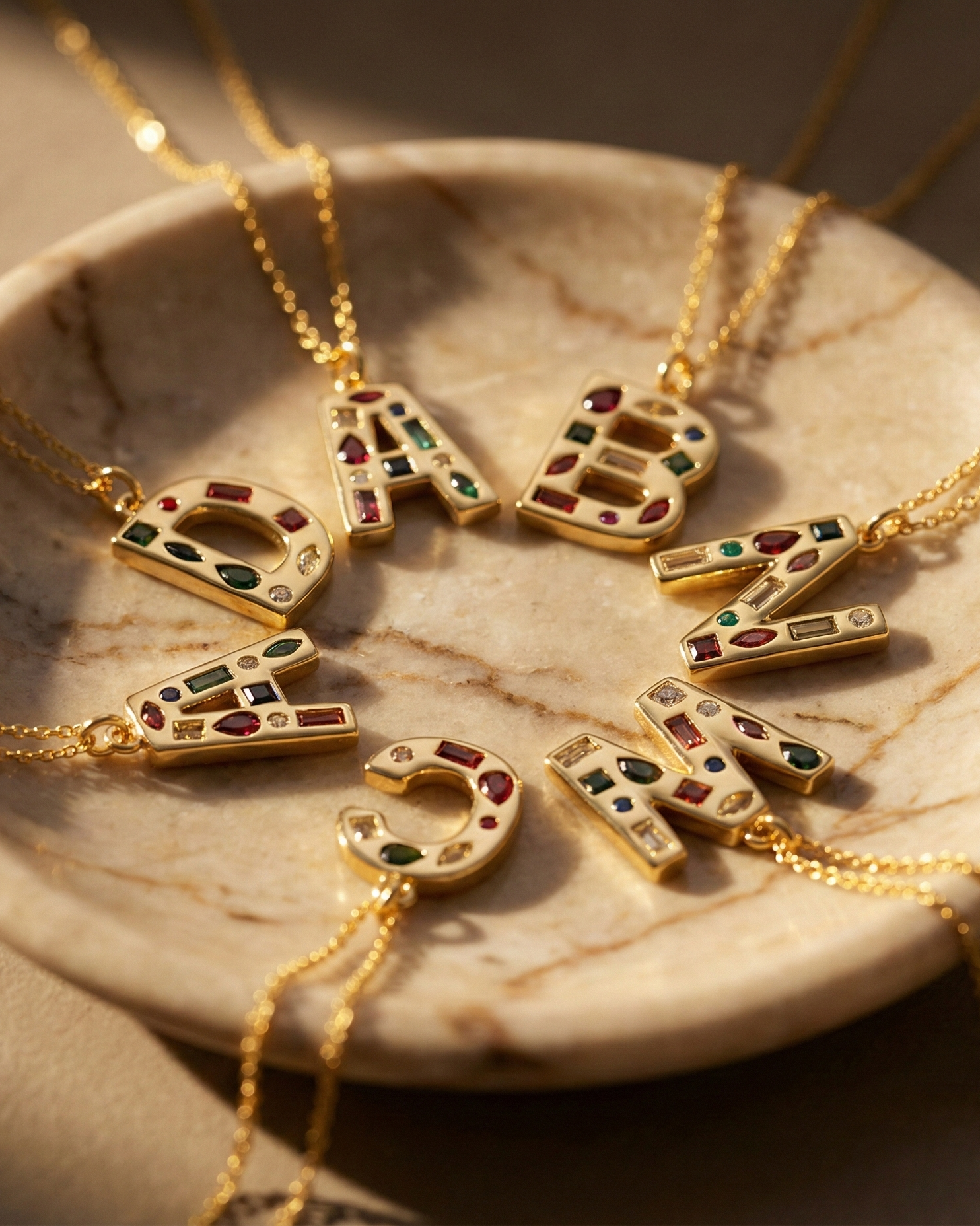 personalized-alphabet-necklace-gift-set, rainbow-crystal-jewelry-collection-circle, custom-letter-jewelry-display-aesthetic, upscale-jewelry-brand-denmark, modern-meaningful-gift-design, waterproof-initial-necklace-gold-pvd