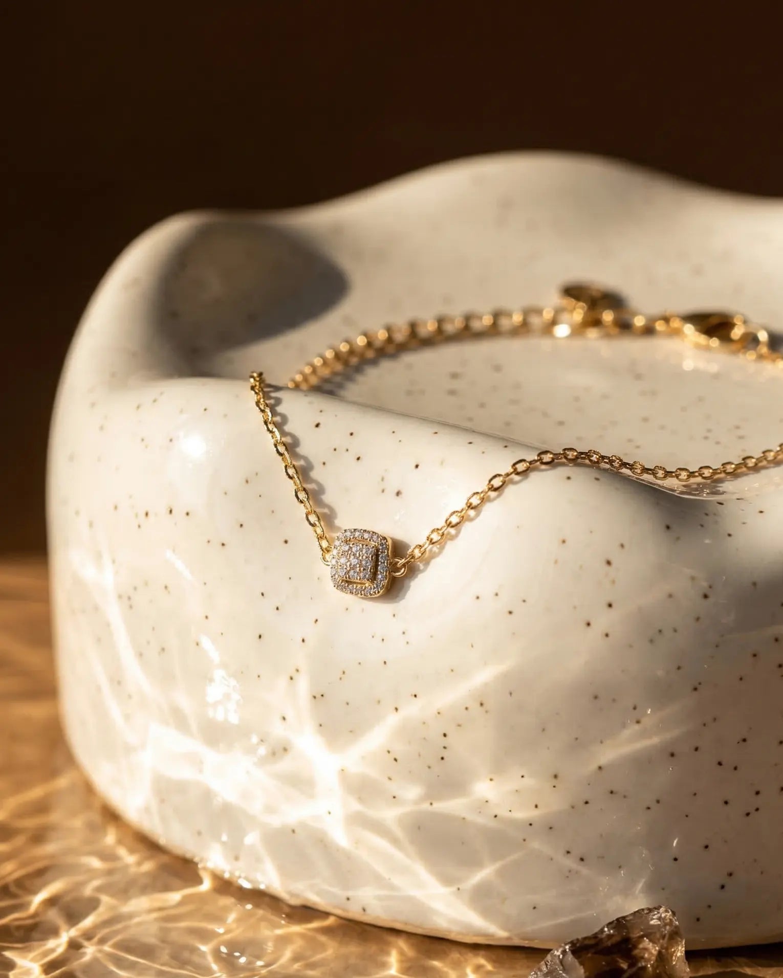 premium-quality-artana-square-pave-gold-bracelet, durable-gold-plating-detail-europe, anniversary-gift-modern-crystal-chain, refined-minimalist-luxe-aesthetic, sustainable-steel-jewelry-brand-europe