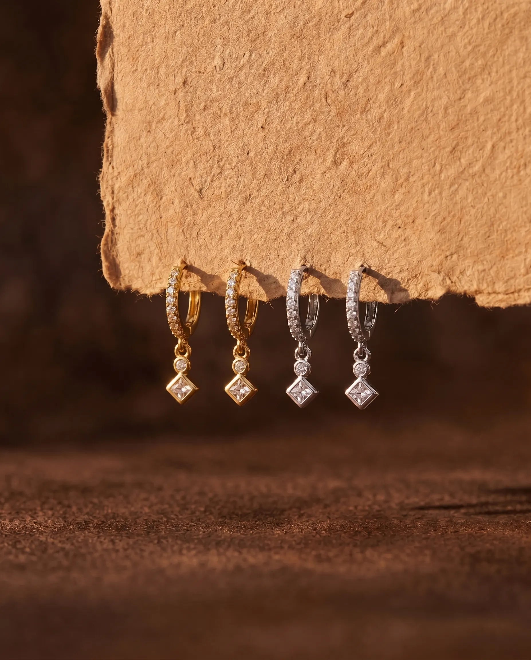 timeless-celestial-aesthetic-mercedes-star-earrings-gold-silver, 18k-gold-vermeil-finish-detail-pave-hoops, gift-ideas-for-women-sparkling-star-jewelry, luxury-boutique-jewelry-netherlands, artistic-jewelry-flatlay-photography