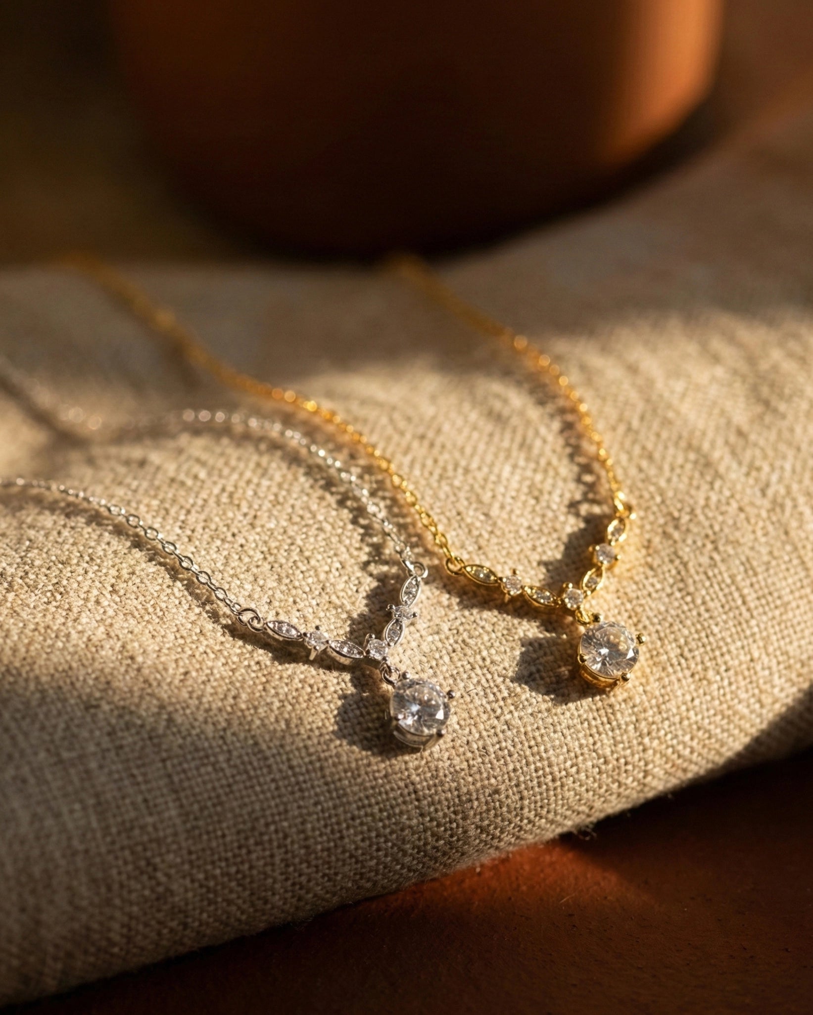 timeless-lariat-aesthetic-necklace-modern-design, 18k-gold-finish-detail-antonietta, gift-ideas-for-women-fine-jewelry, luxury-boutique-jewelry-netherlands, artistic-jewelry-flatlay-photography