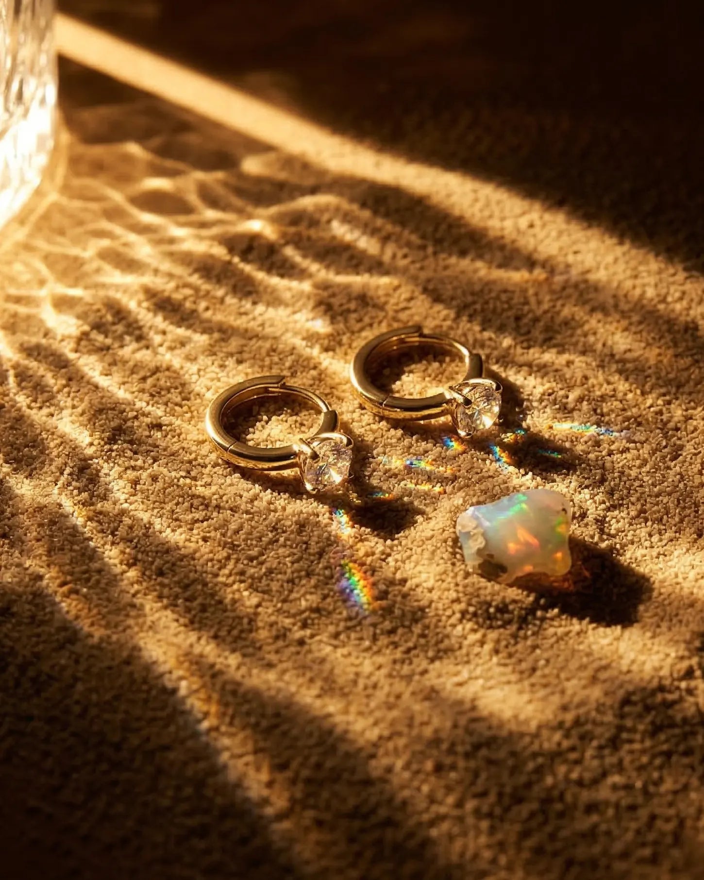 timeless-modern-aesthetic-knot-stud-earrings-gold, 18k-gold-vermeil-finish-detail-cara-studs, gift-ideas-for-women-elegant-silver-jewelry, luxury-boutique-jewelry-netherlands, artistic-jewelry-flatlay-photography