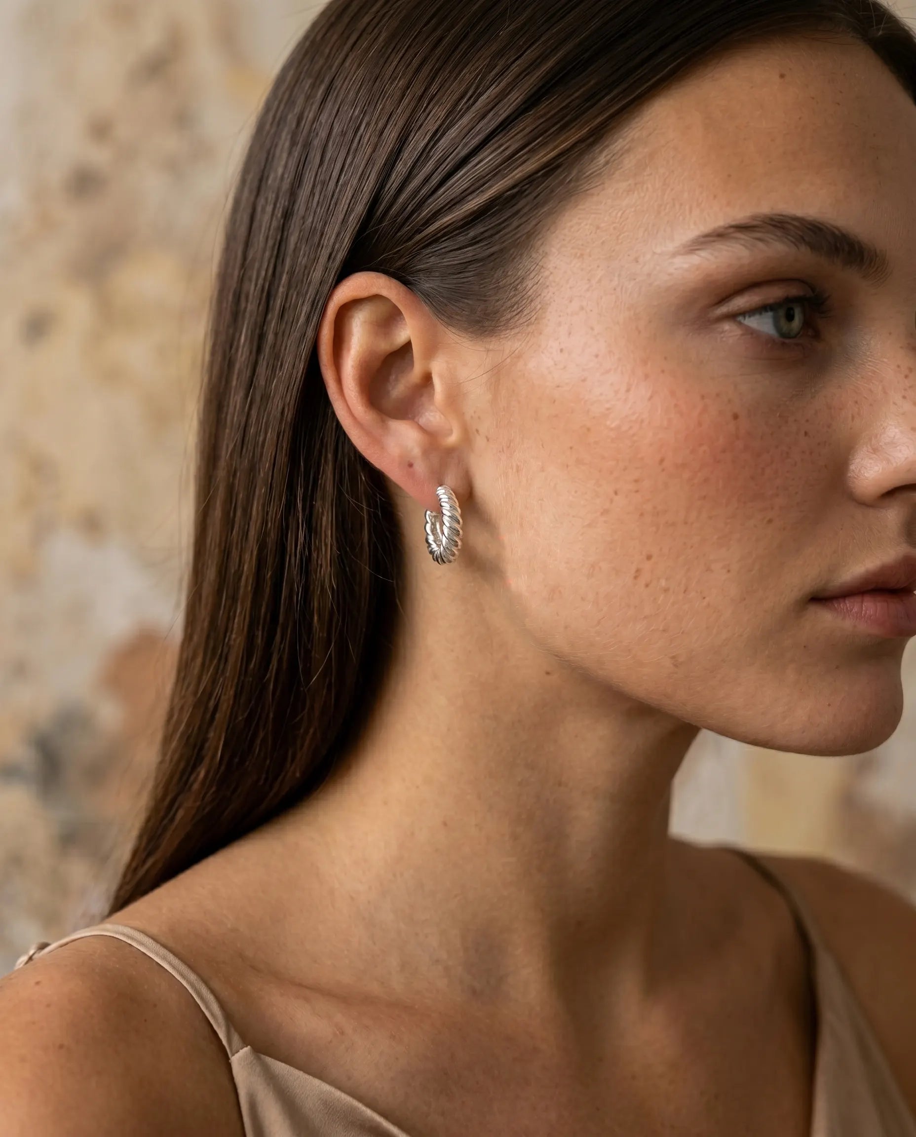 versatile-daily-wear-gold-museful-twisted-studs, effortless-feminine-shimmer-jewelry-style, minimalist-accessories-for-curated-look, classy-316l-steel-spiral-earrings-lifestyle, senya-jewelry-museful-collection