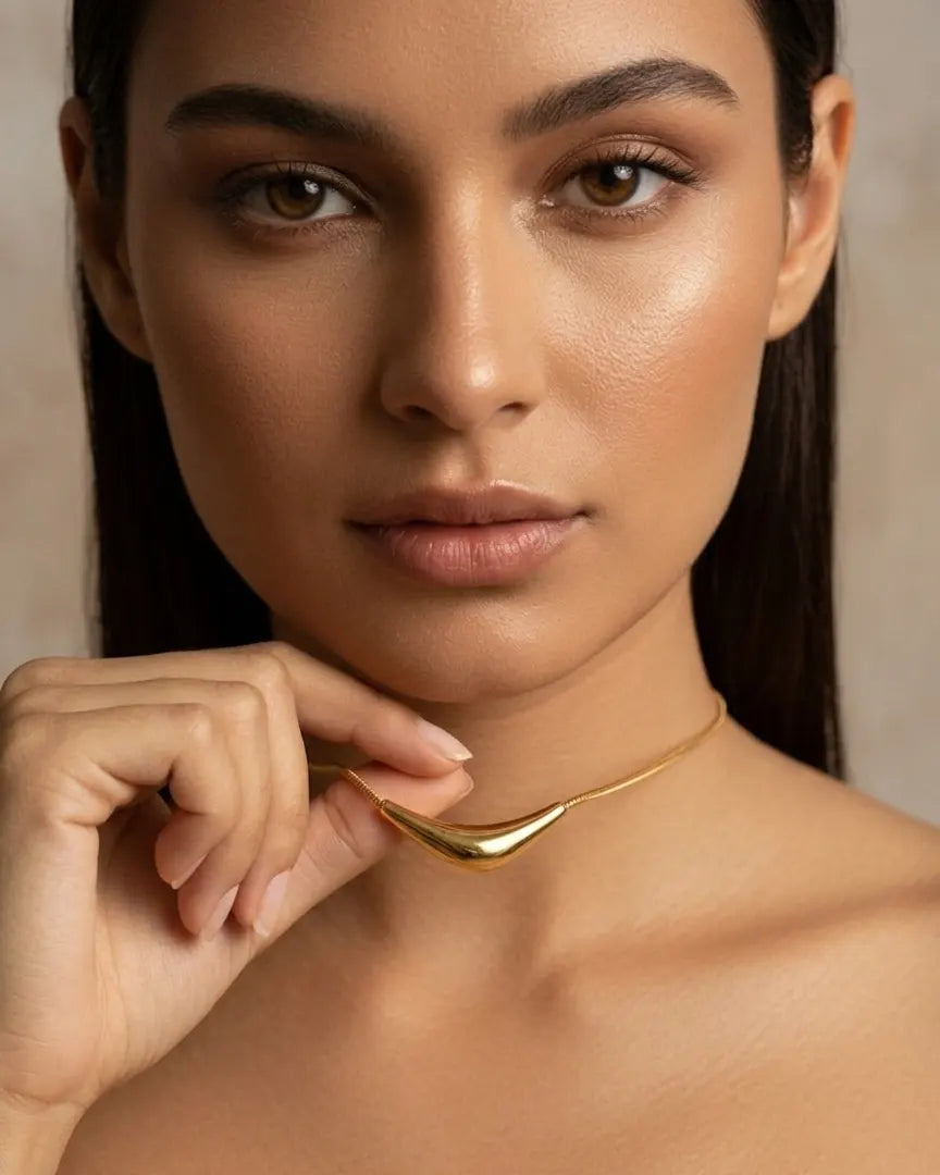 versatile-daily-wear-gold-prestige-statement-necklace, effortless-high-end-sculptural-style, minimalist-accessories-for-refined-look, classy-stainless-steel-arc-necklace-lifestyle, senya-jewelry-prestige-collection