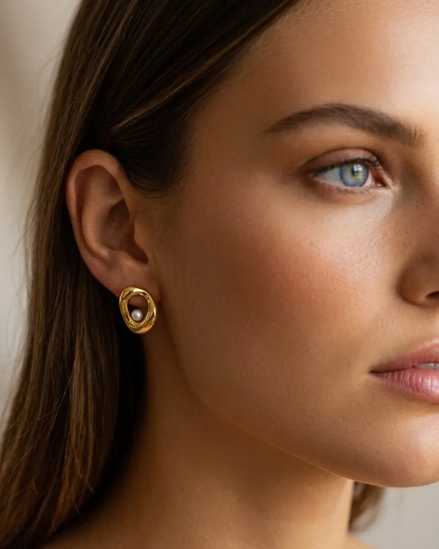 versatile-daily-wear-silver-cybelle-statement-earrings, effortless-high-end-liquid-silver-style, minimalist-accessories-for-refined-look, classy-stainless-steel-teardrop-earrings-lifestyle, senya-jewelry-cybelle-collection