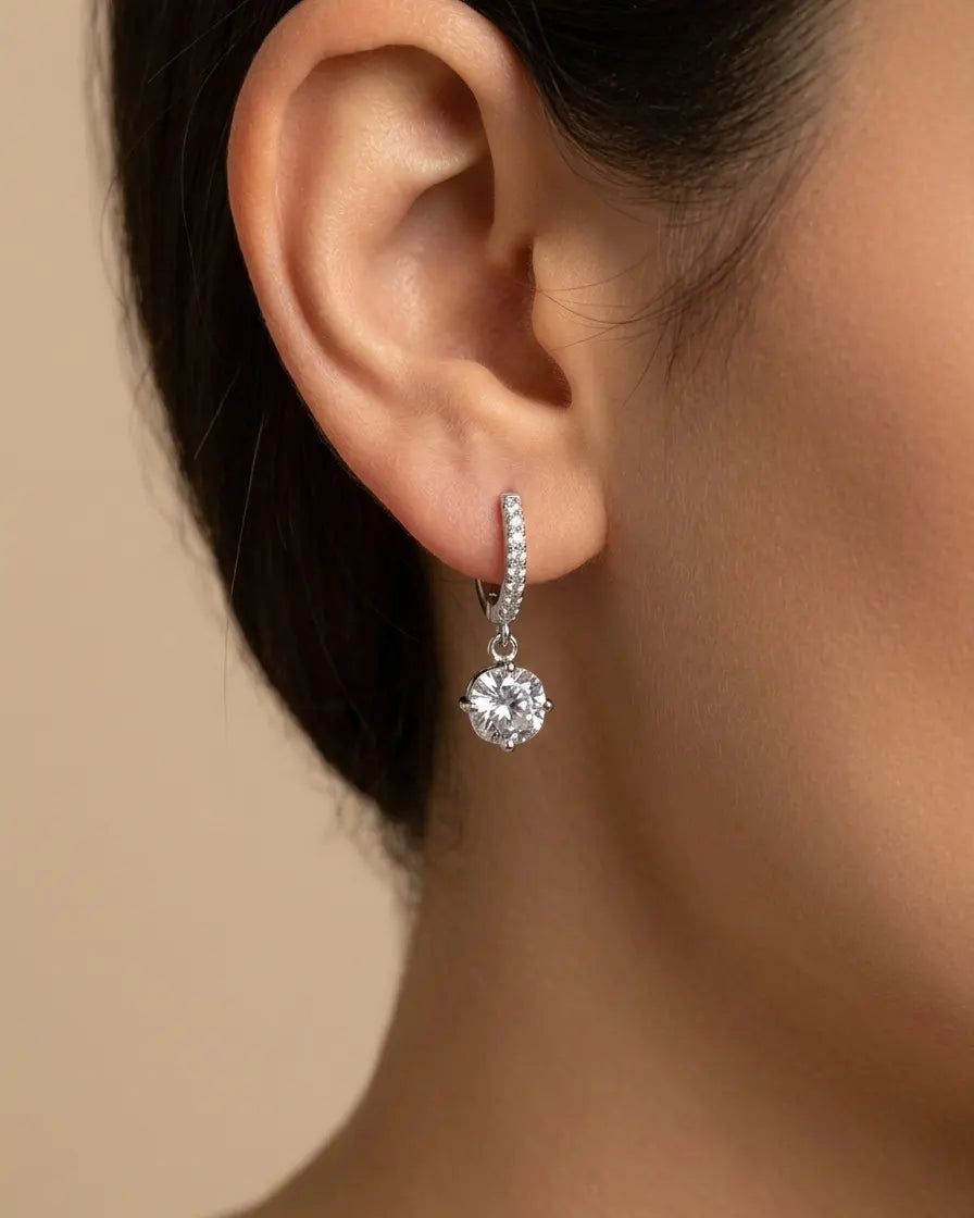 versatile-daily-wear-silver-dafne-statement-earrings, effortless-high-end-crystal-drop-style, minimalist-accessories-for-refined-look, classy-925-silver-solitaire-earrings-lifestyle, senya-jewelry-dafne-collection