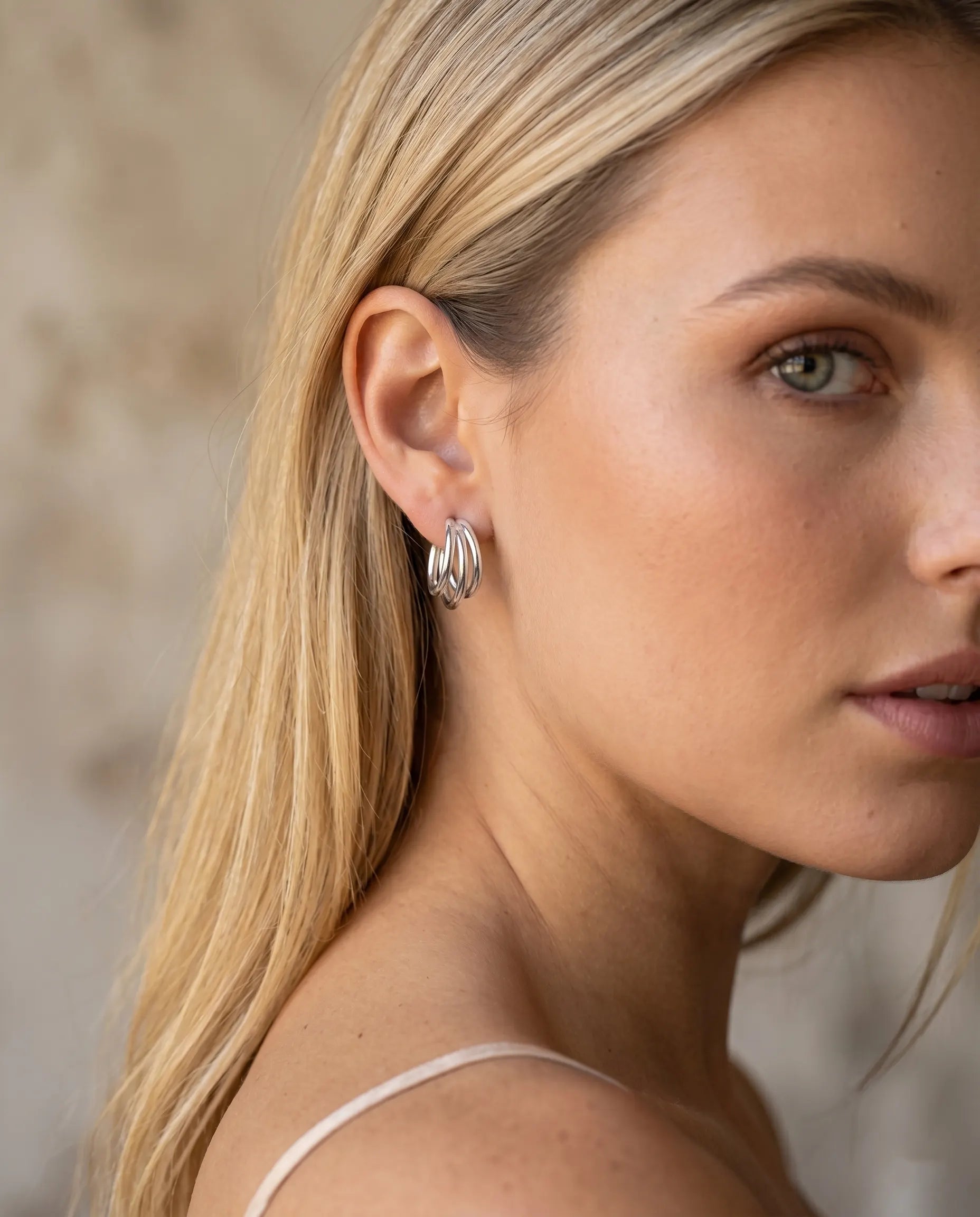 versatile-daily-wear-silver-lola-statement-earrings, effortless-high-end-multi-row-ear-stack, minimalist-accessories-for-refined-look, classy-925-silver-layered-hoops-lifestyle, senya-jewelry-lola-collection