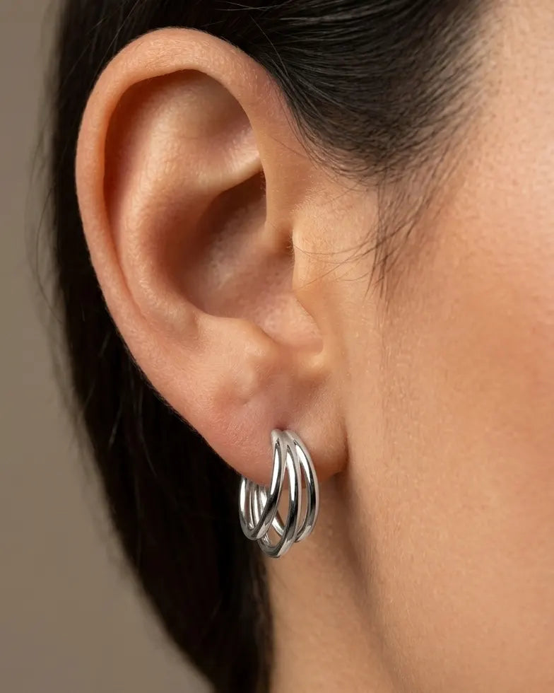 versatile-daily-wear-silver-lola-statement-earrings, effortless-high-end-multi-row-ear-stack, minimalist-accessories-for-refined-look, classy-925-silver-layered-hoops-lifestyle, senya-jewelry-lola-collection