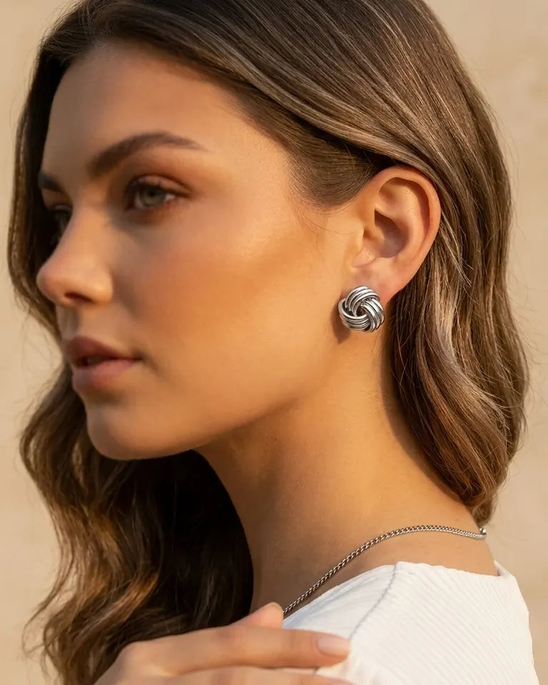 versatile-daily-wear-silver-samira-knot-studs, effortless-feminine-jewelry-style, minimalist-accessories-for-curated-look, classy-316l-steel-knot-earrings-lifestyle, senya-jewelry-samira-collection