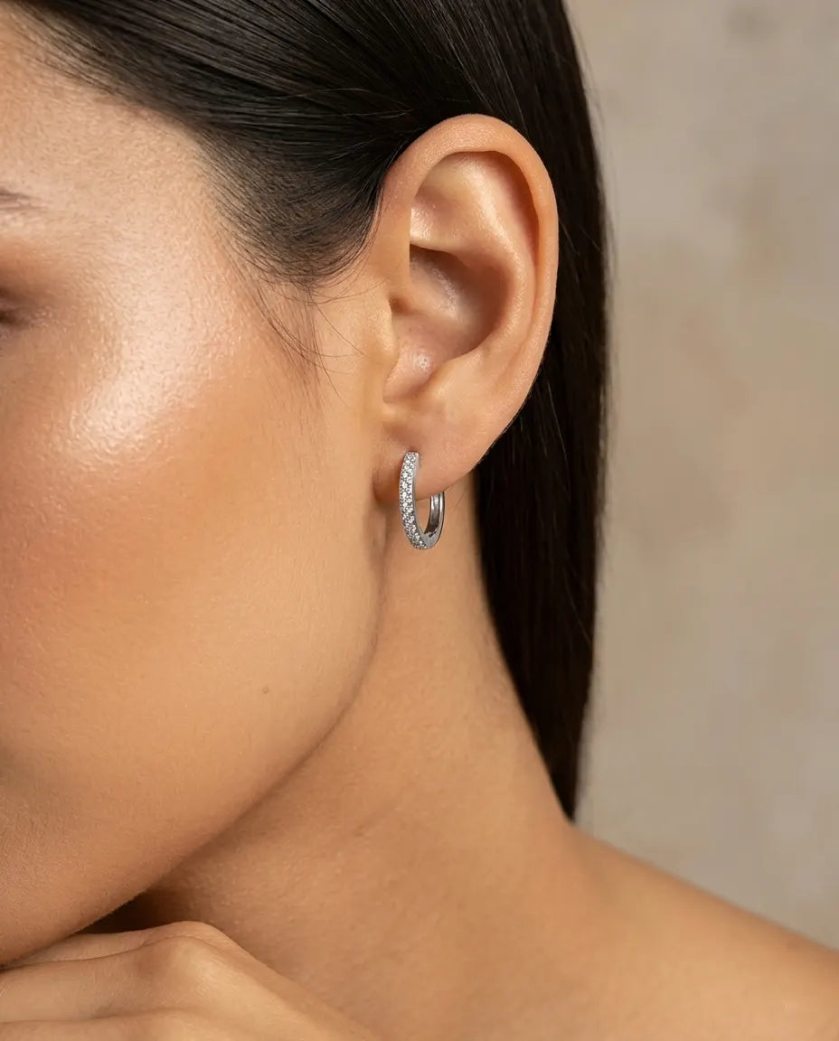 versatile-daily-wear-silver-zirconia-hoops, effortless-elegance-jewelry-style, minimalist-accessories-for-night-out, classy-925-silver-sparkling-earrings, high-shine-emery-collection-earrings