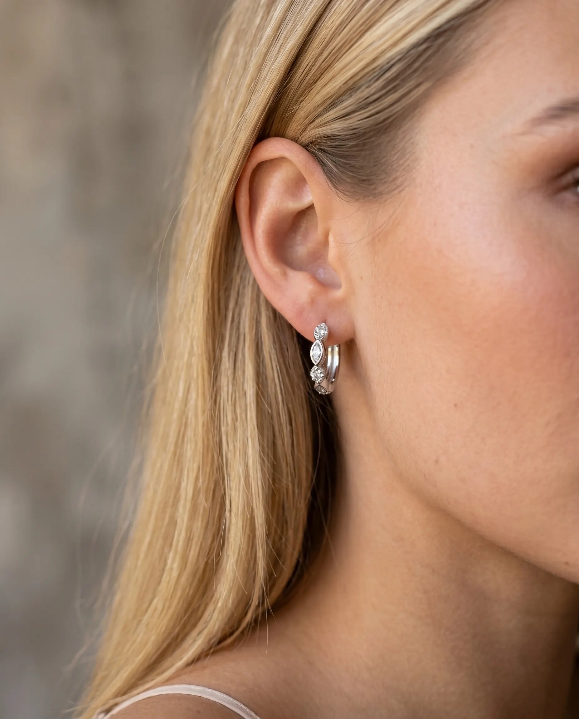 versatile-daily-wear-sparkle-earrings, effortless-elegance-jewelry-style, minimalist-accessories-for-special-occasions, classy-gold-vermeil-earrings-lifestyle, high-shine-925-silver-huggies, senya-jewelry-verity-collection