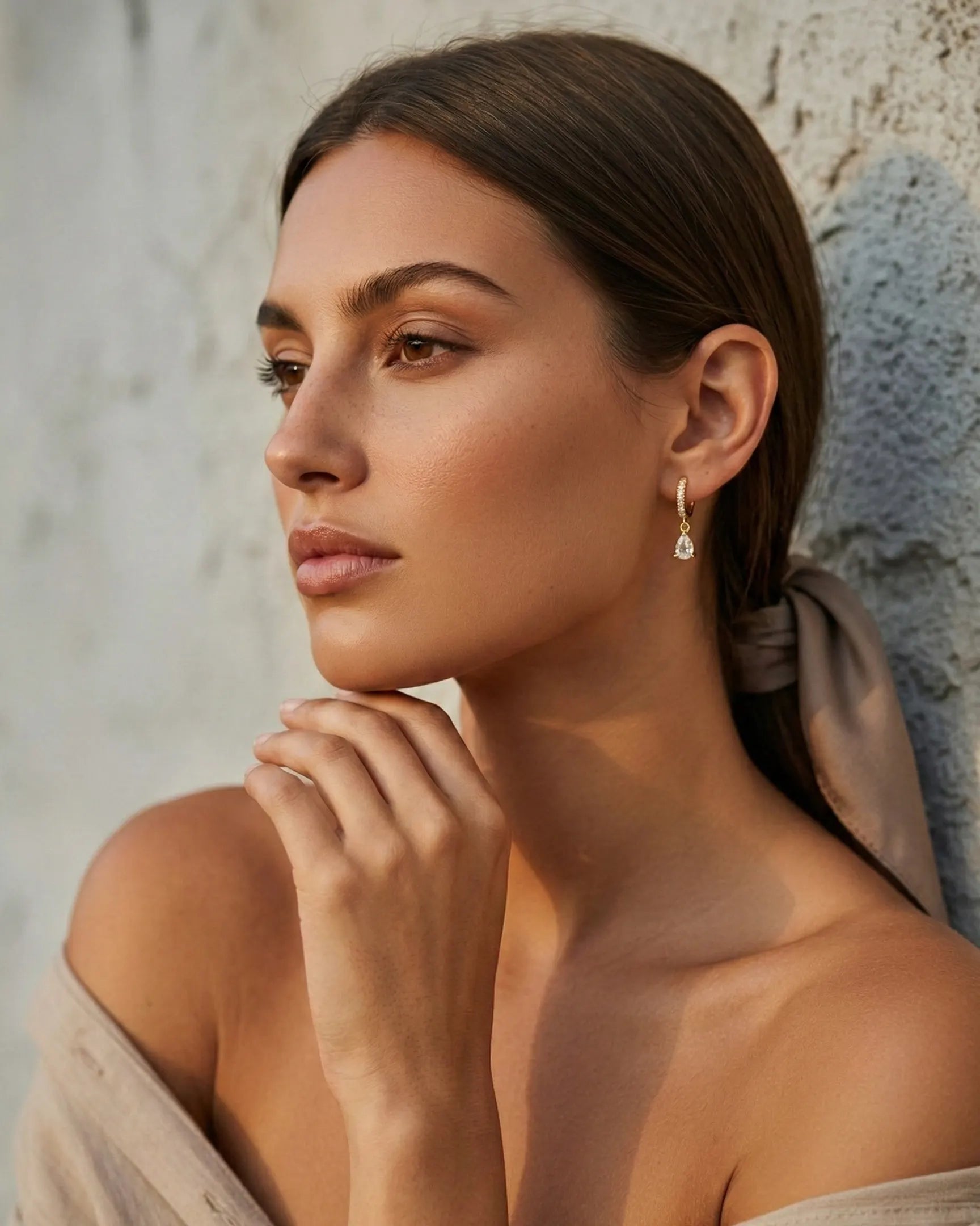 versatile-daily-wear-teardrop-crystal-huggies, effortless-elegance-jewelry-style, minimalist-accessories-for-refined-look, classy-925-silver-teardrop-earrings, high-shine-quiola-collection-earrings