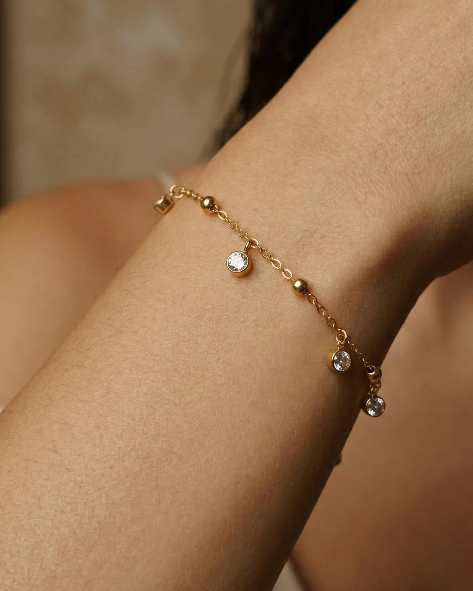 versatile-daily-wear-zirconia-station-bracelet, effortless-shimmer-jewelry-style, minimalist-accessories-for-gym-to-office, classy-gold-pvd-bracelet-lifestyle, senya-jewelry-alora-collection