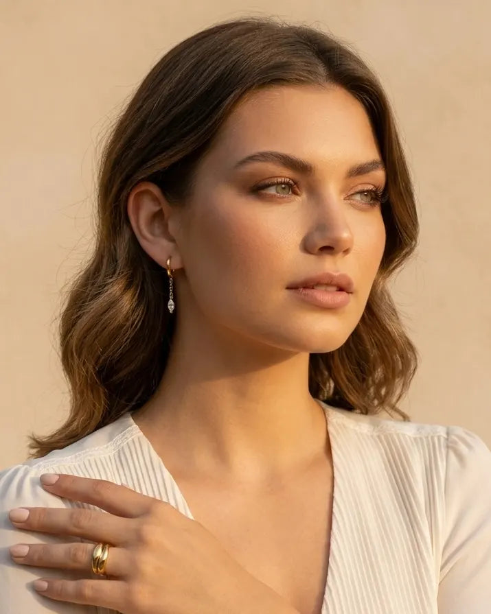 versatile-evening-wear-marquise-drop-hoops, effortless-allure-jewelry-style, minimalist-accessories-for-silk-blouses, classy-gold-plated-earrings-lifestyle, senya-jewelry-angelique-collection